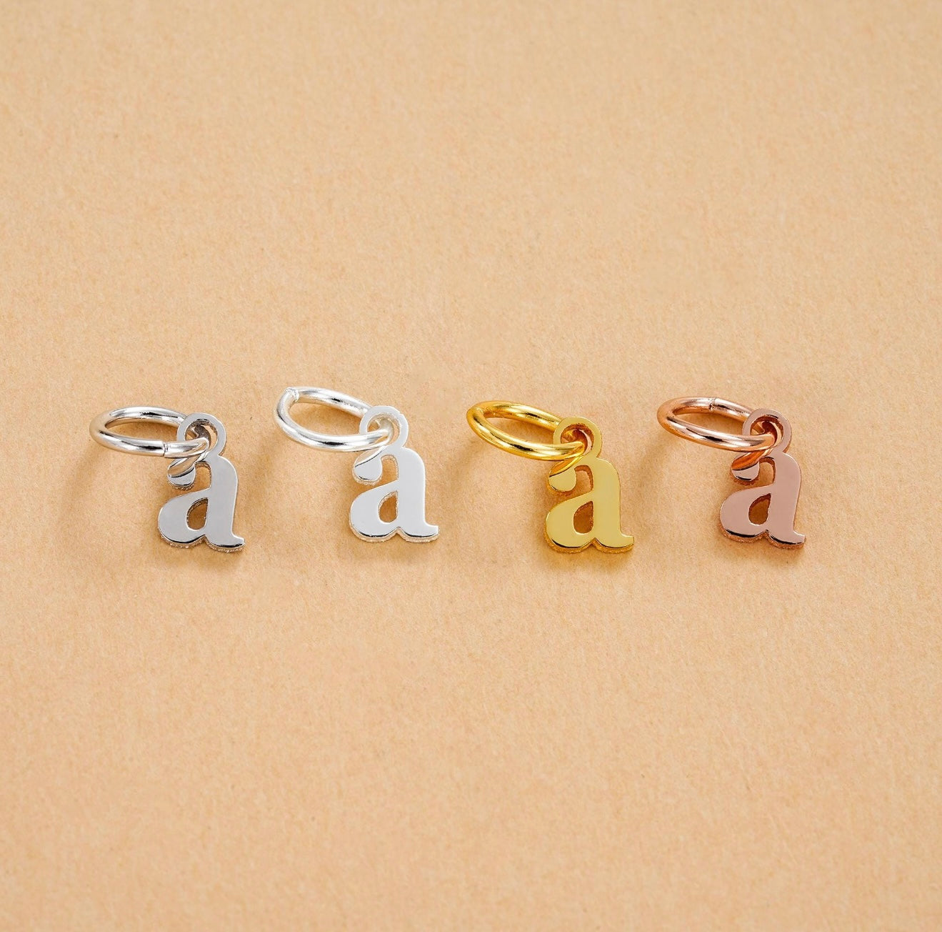 Small letter charms